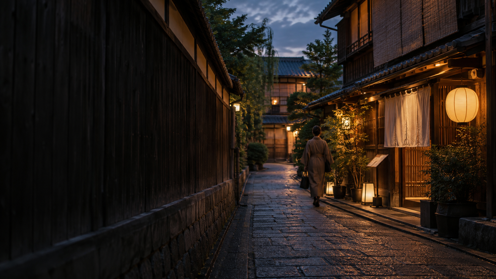 A traveler walking along a quiet Japanese lane toward a warmly lit local restaurant at dusk